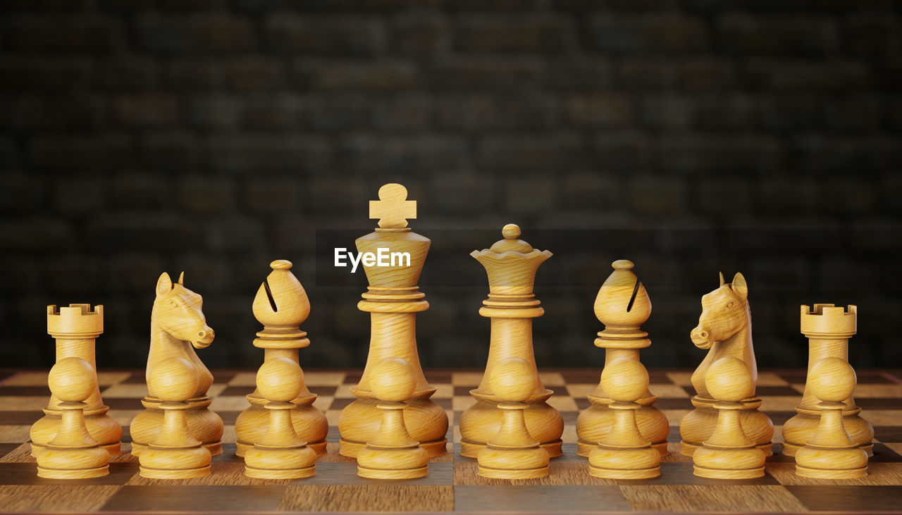 CLOSE-UP OF CHESS ON TABLE