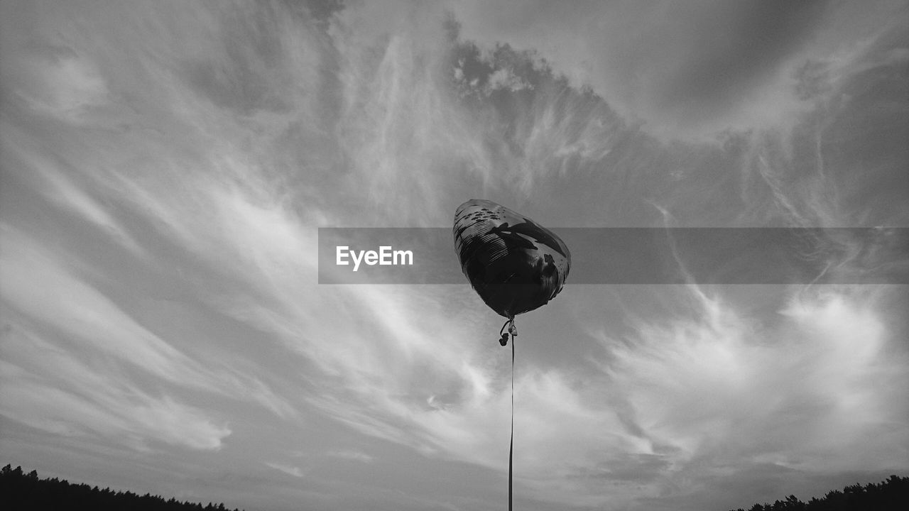 LOW ANGLE VIEW OF HOT AIR BALLOONS AGAINST SKY