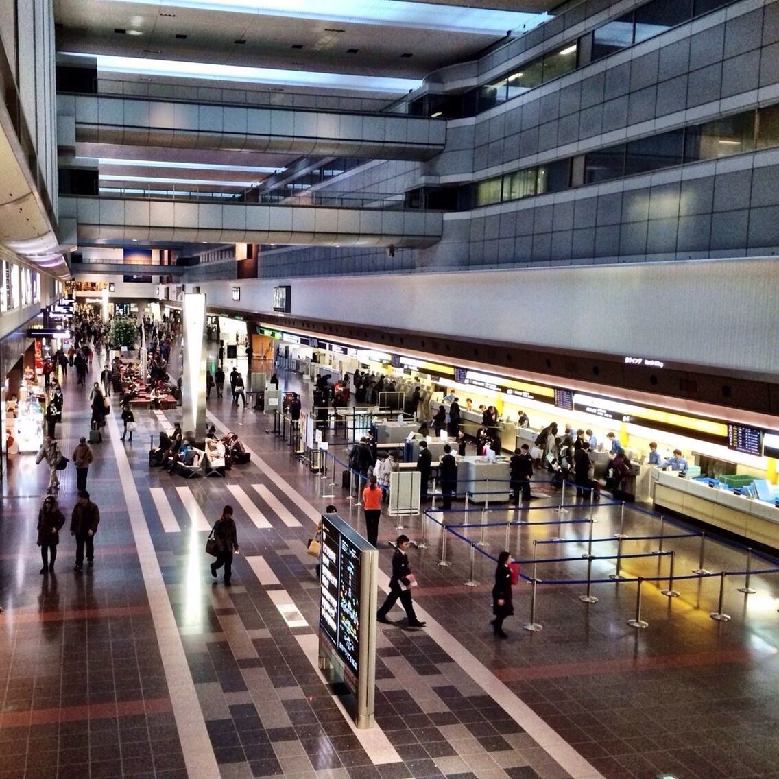 PEOPLE WAITING AT SUBWAY STATION