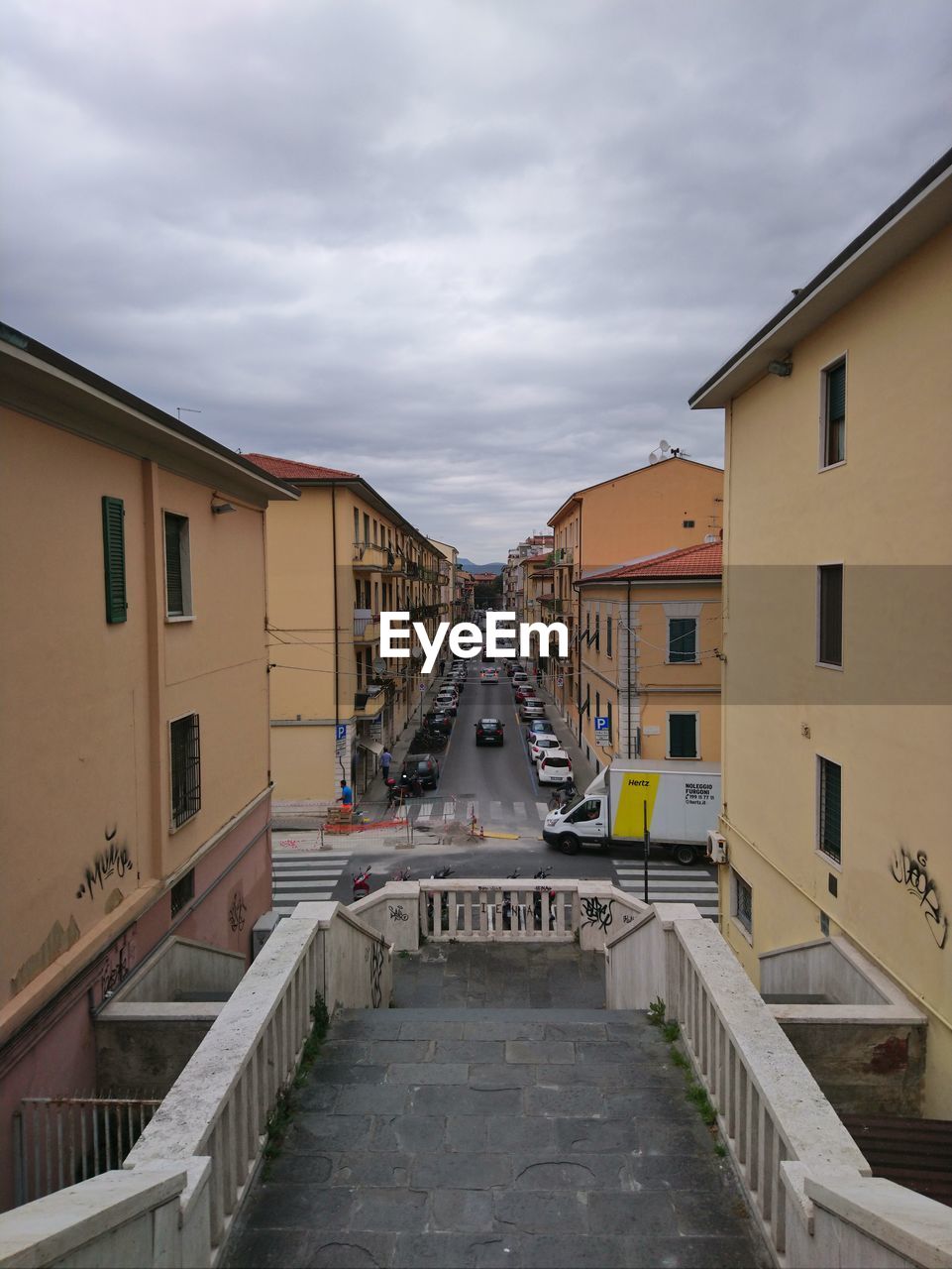 STREET AMIDST BUILDINGS IN CITY