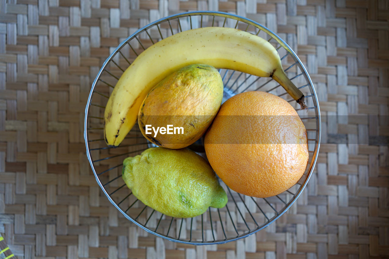 HIGH ANGLE VIEW OF FRUITS IN BASKET