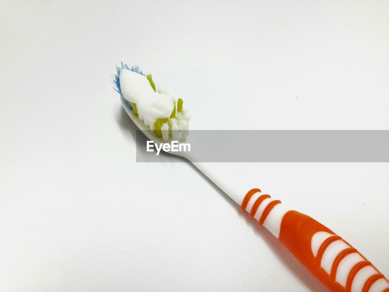Close-up of toothbrush on white background