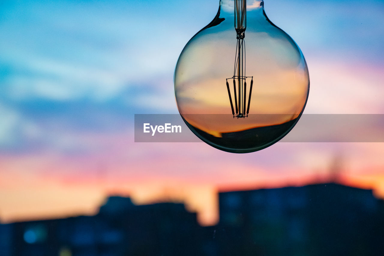 Beautiful defocused sunset in a light bulb. sunset or sunrise background