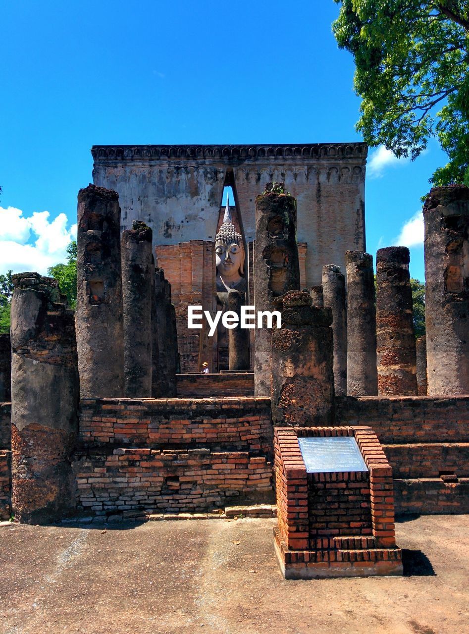 OLD RUINS AGAINST BLUE SKY