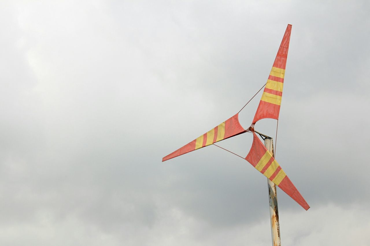 LOW ANGLE VIEW OF FLAGS FLAG AGAINST SKY