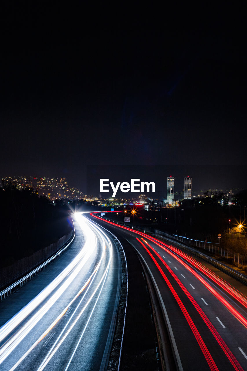 Light trails on road at night