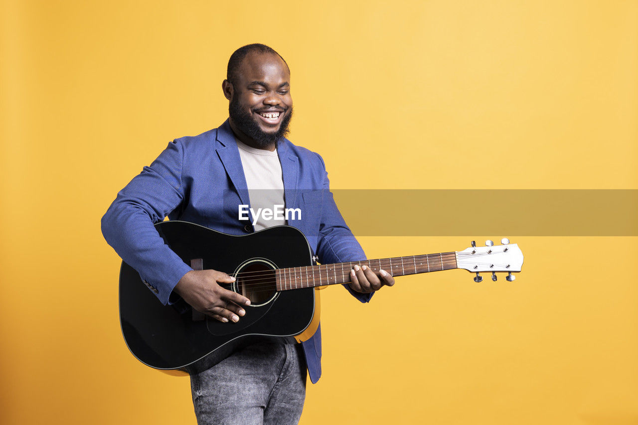 man playing guitar