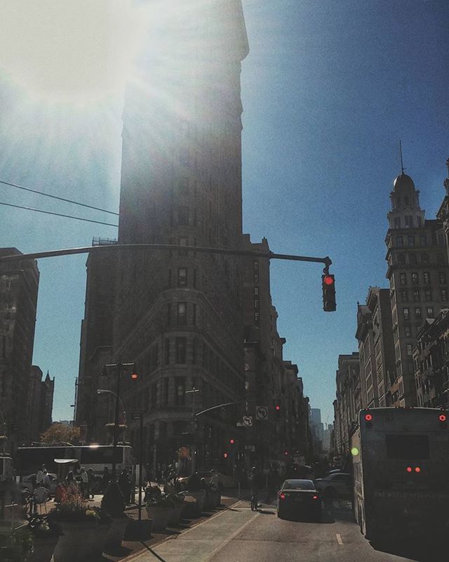 VIEW OF CITY STREET AGAINST SKY