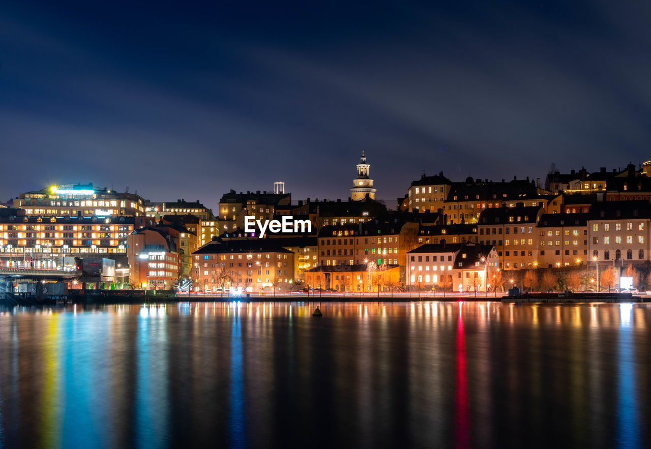 Illuminated buildings in city at night