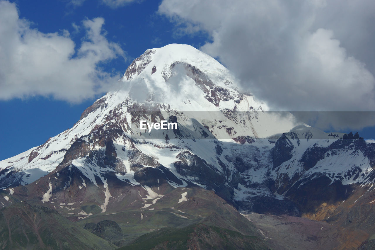 LOW ANGLE VIEW OF MOUNTAIN AGAINST SKY