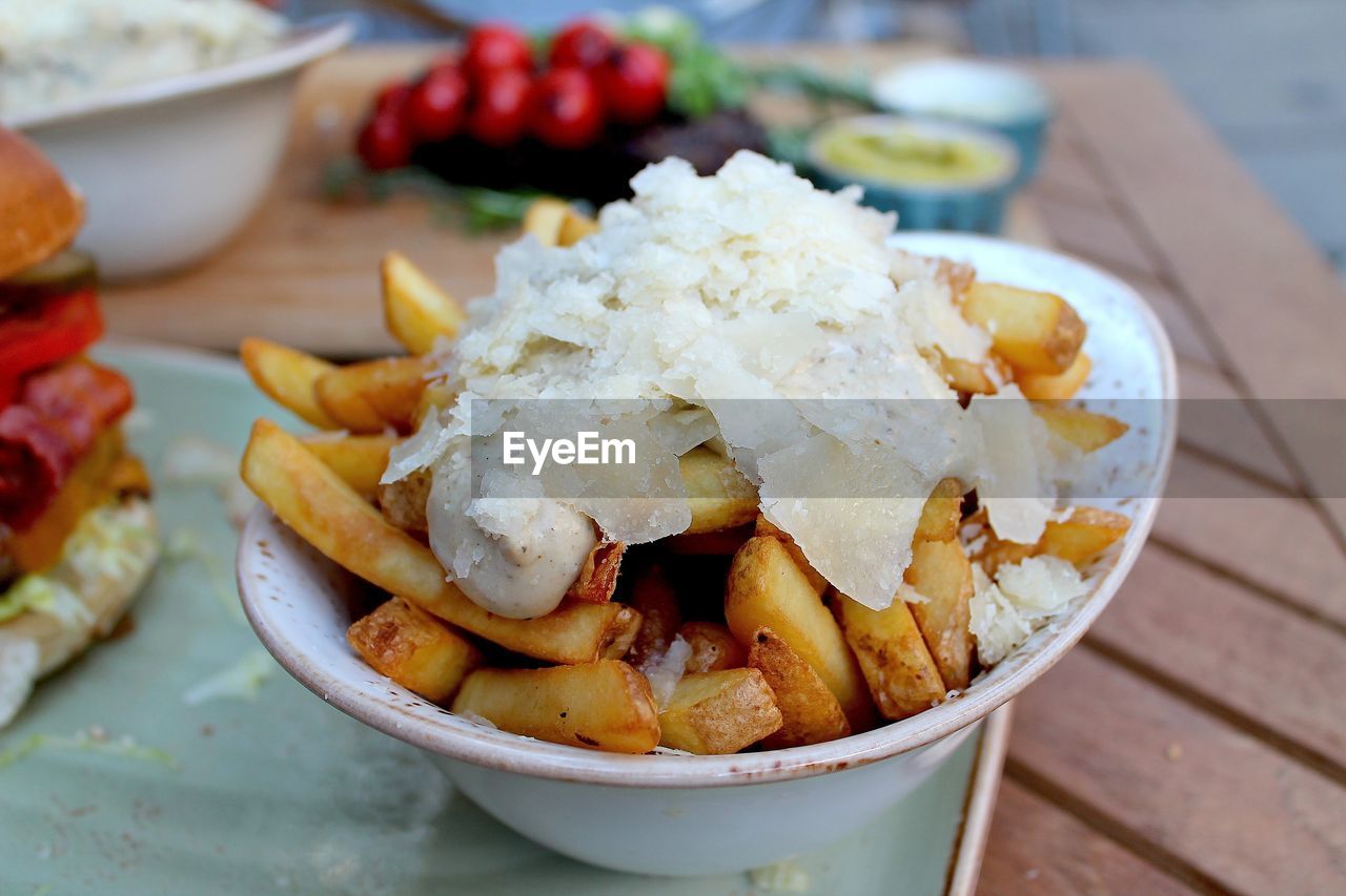 High angle view of french fries in bowl on table