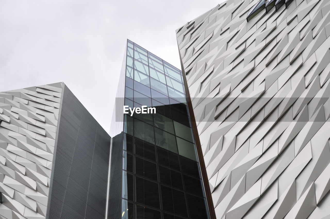 Low angle view of modern buildings against sky