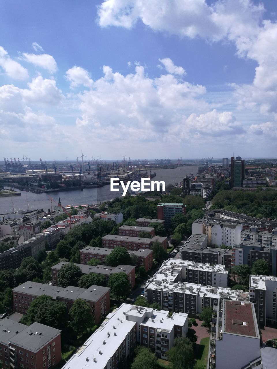 Aerial view of cityscape against sky