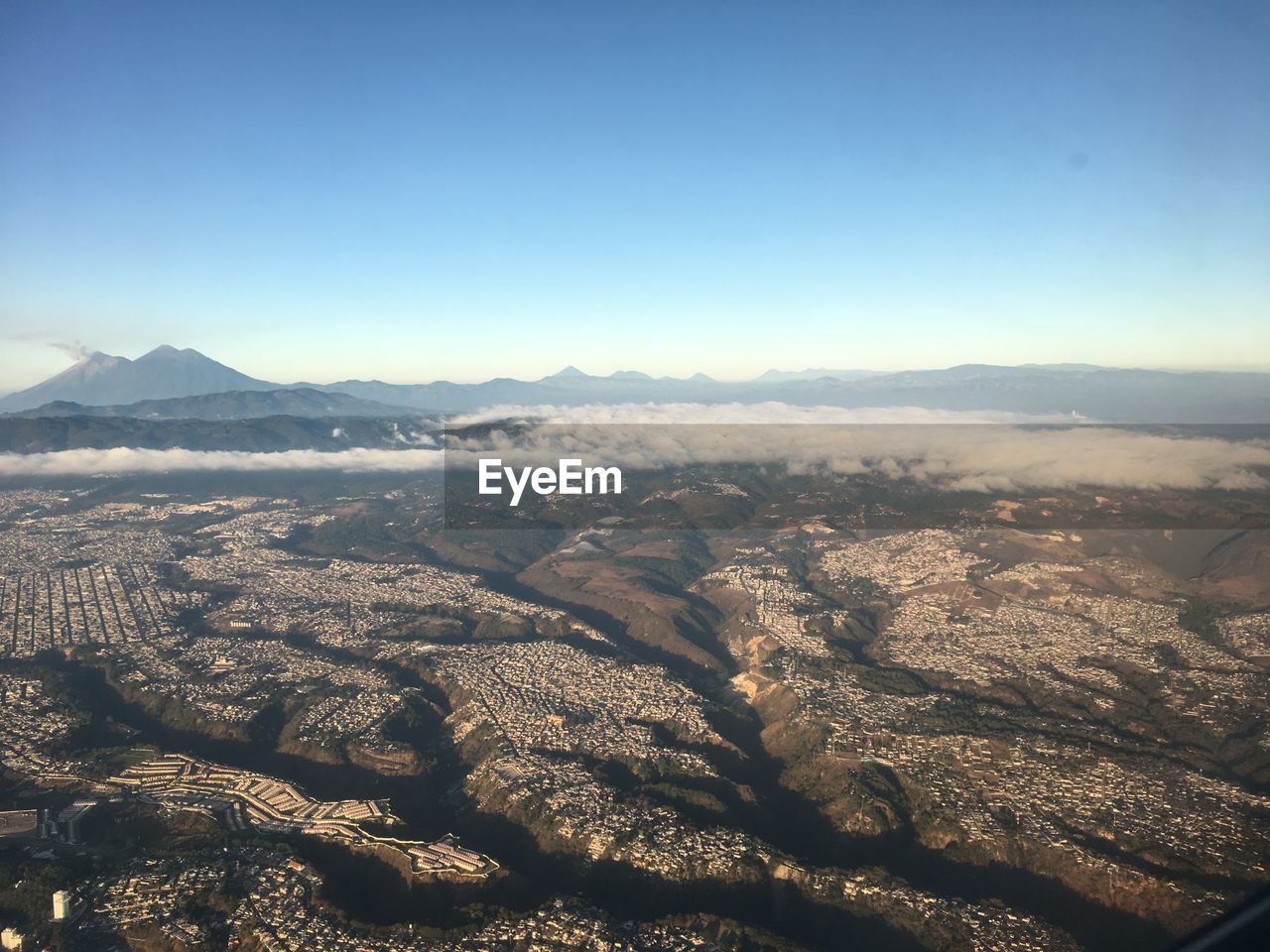 Aerial view of landscape against clear sky