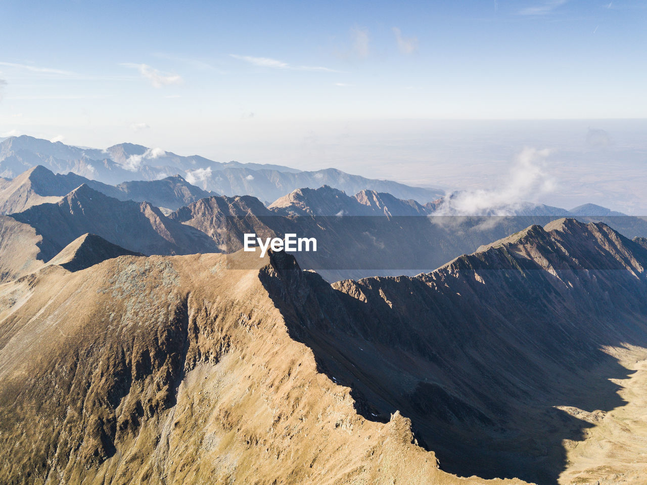 PANORAMIC VIEW OF MOUNTAINS AGAINST SKY