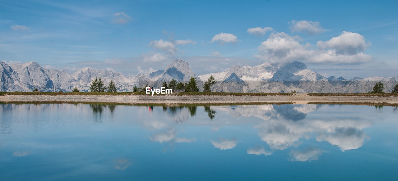 REFLECTION OF CLOUDS IN WATER