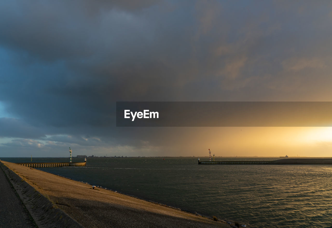 Scenic view of sea against sky during sunset