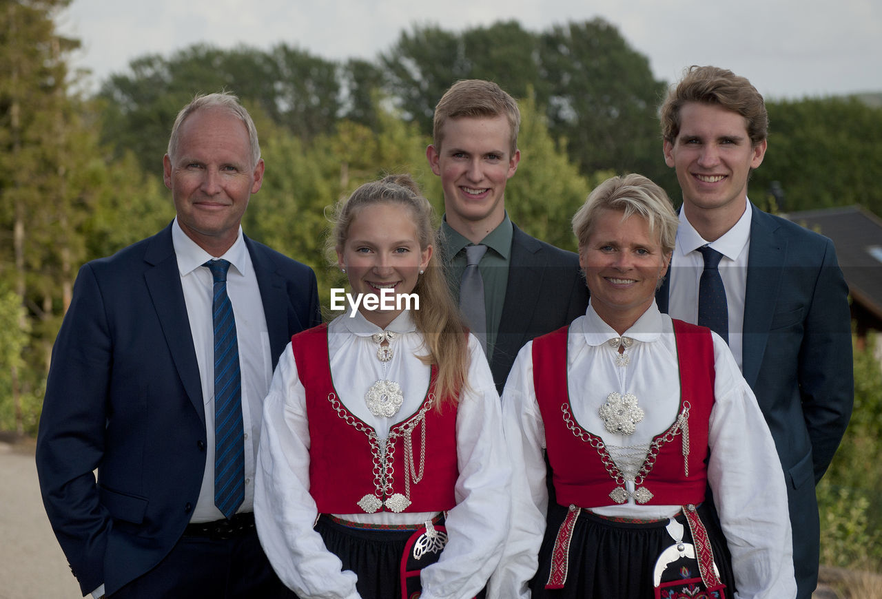 Portrait of smiling family standing