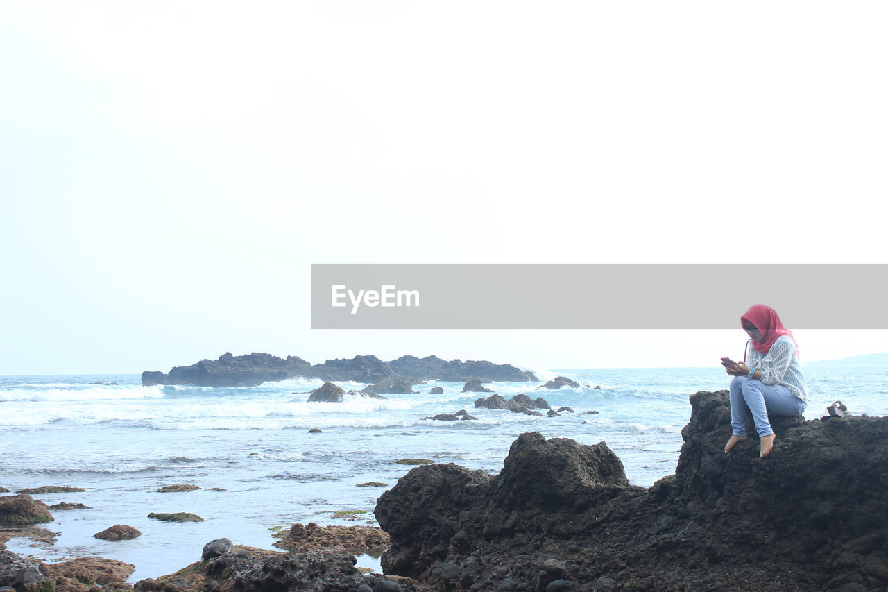 Scenic view of sea against clear sky