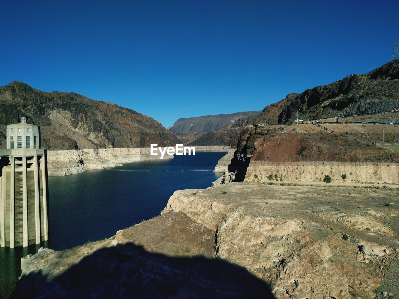 SCENIC VIEW OF MOUNTAINS AGAINST CLEAR SKY