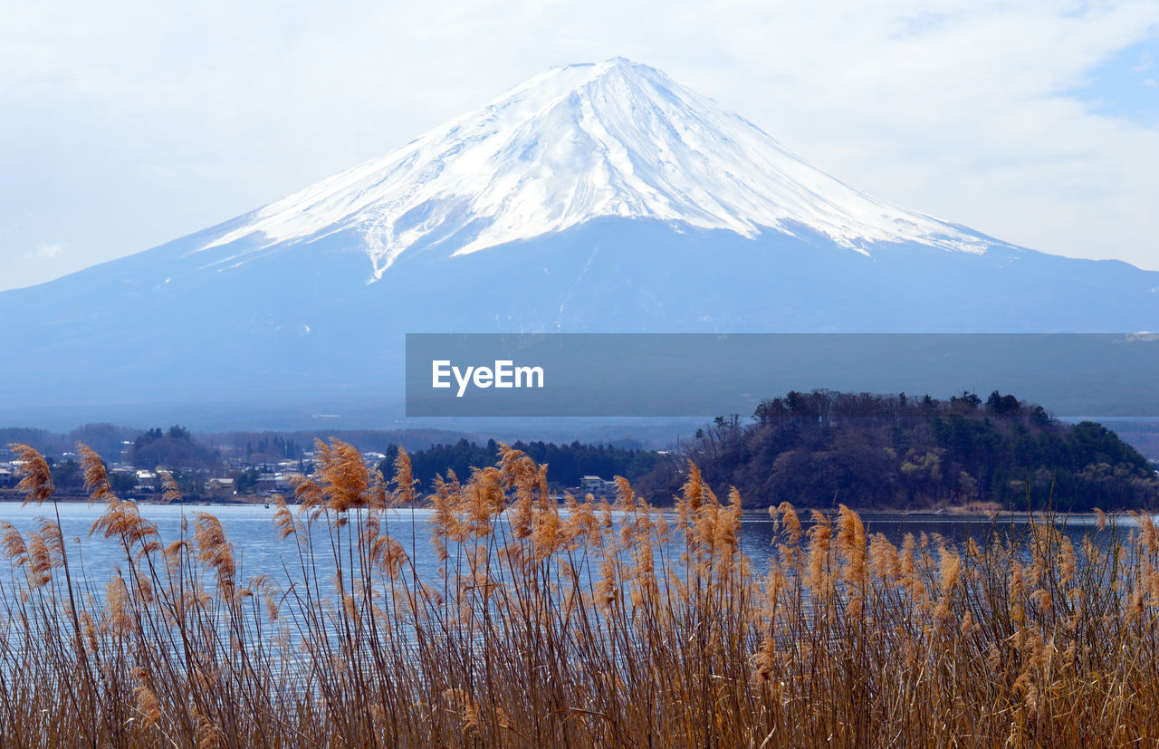 The iconic active volcano in japan - fuji mount in a cloudy day. view from lake kawaguchiko