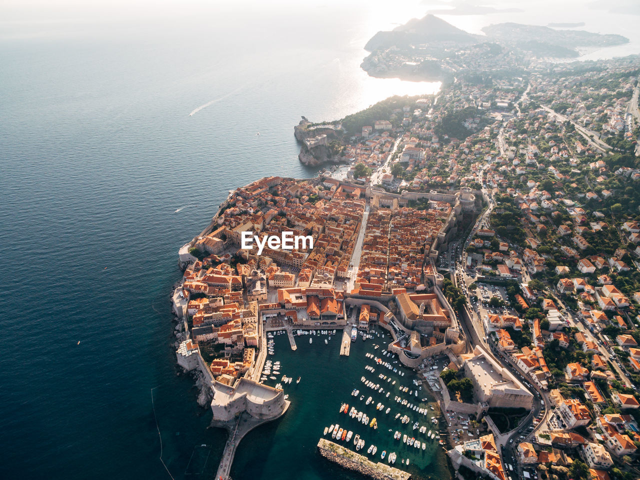 HIGH ANGLE VIEW OF BUILDINGS AT WATERFRONT