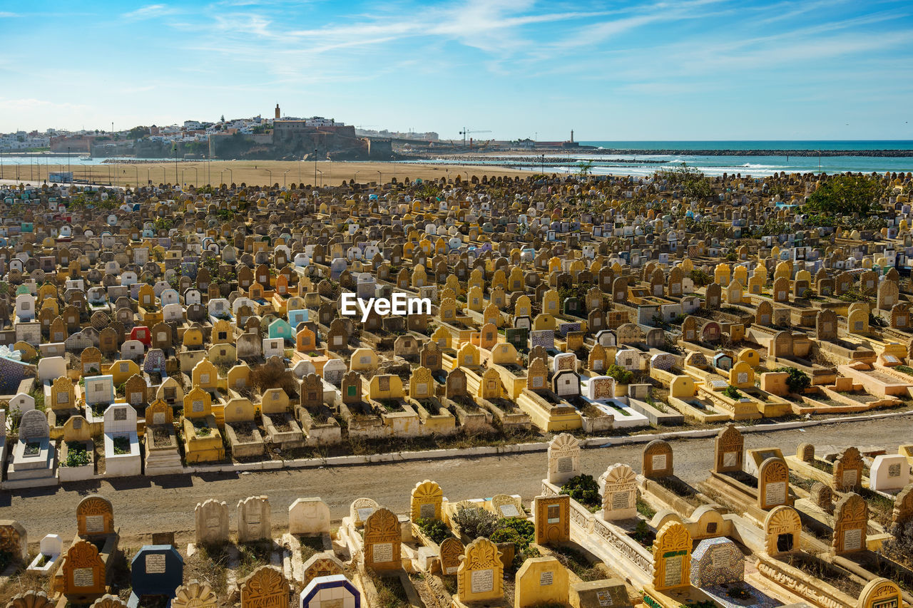 high angle view of people at beach against sky