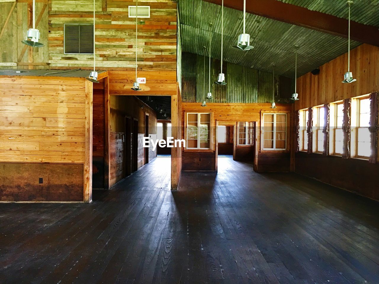 EMPTY NARROW CORRIDOR ALONG WALLS