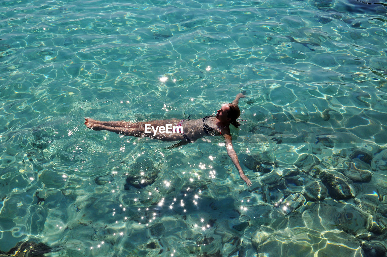 High angle view of woman in sea
