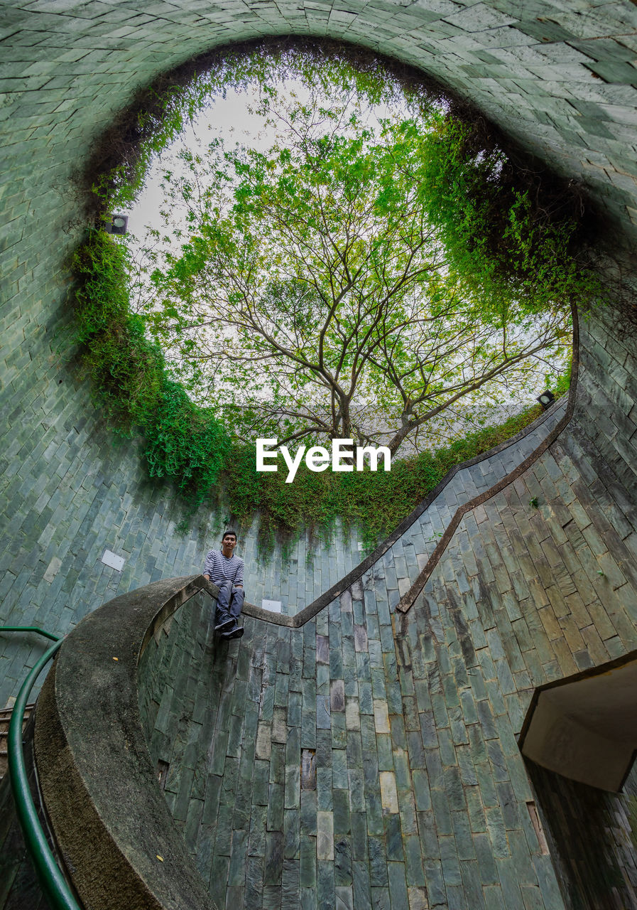 HIGH ANGLE VIEW OF PEOPLE BY WATER