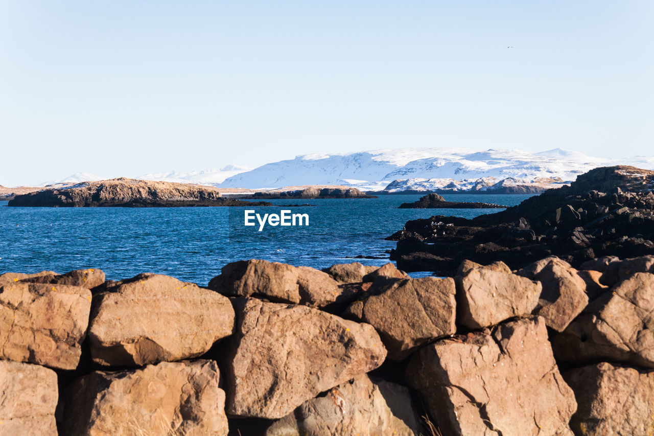 Scenic view of sea against clear sky