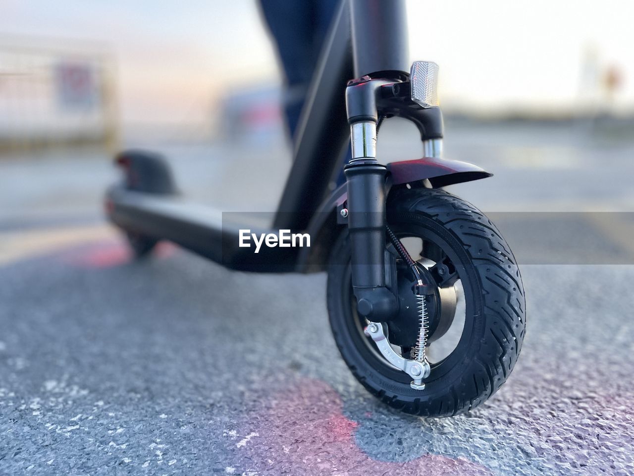 Close-up of motorcycle on road