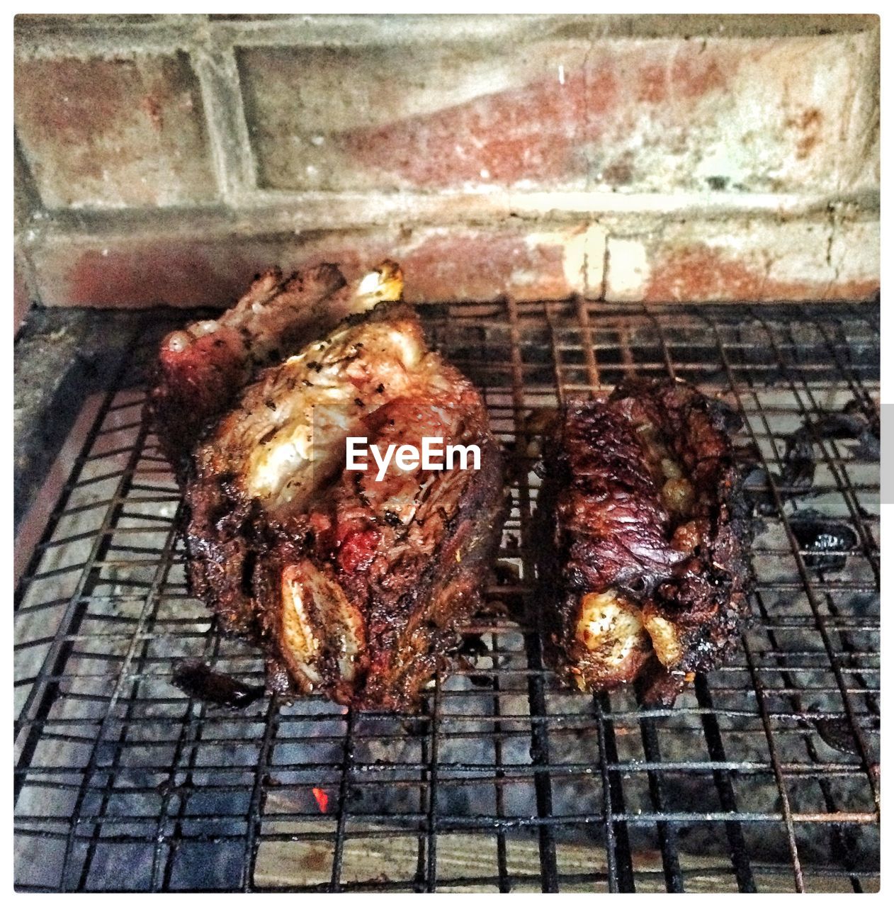 BARBECUE MEAT ON BARBECUE GRILL