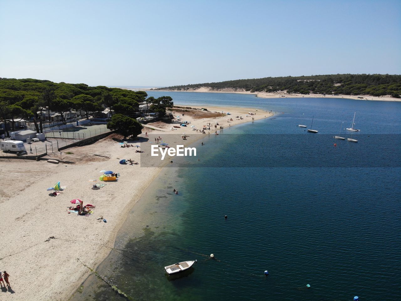 HIGH ANGLE VIEW OF BOATS ON BEACH