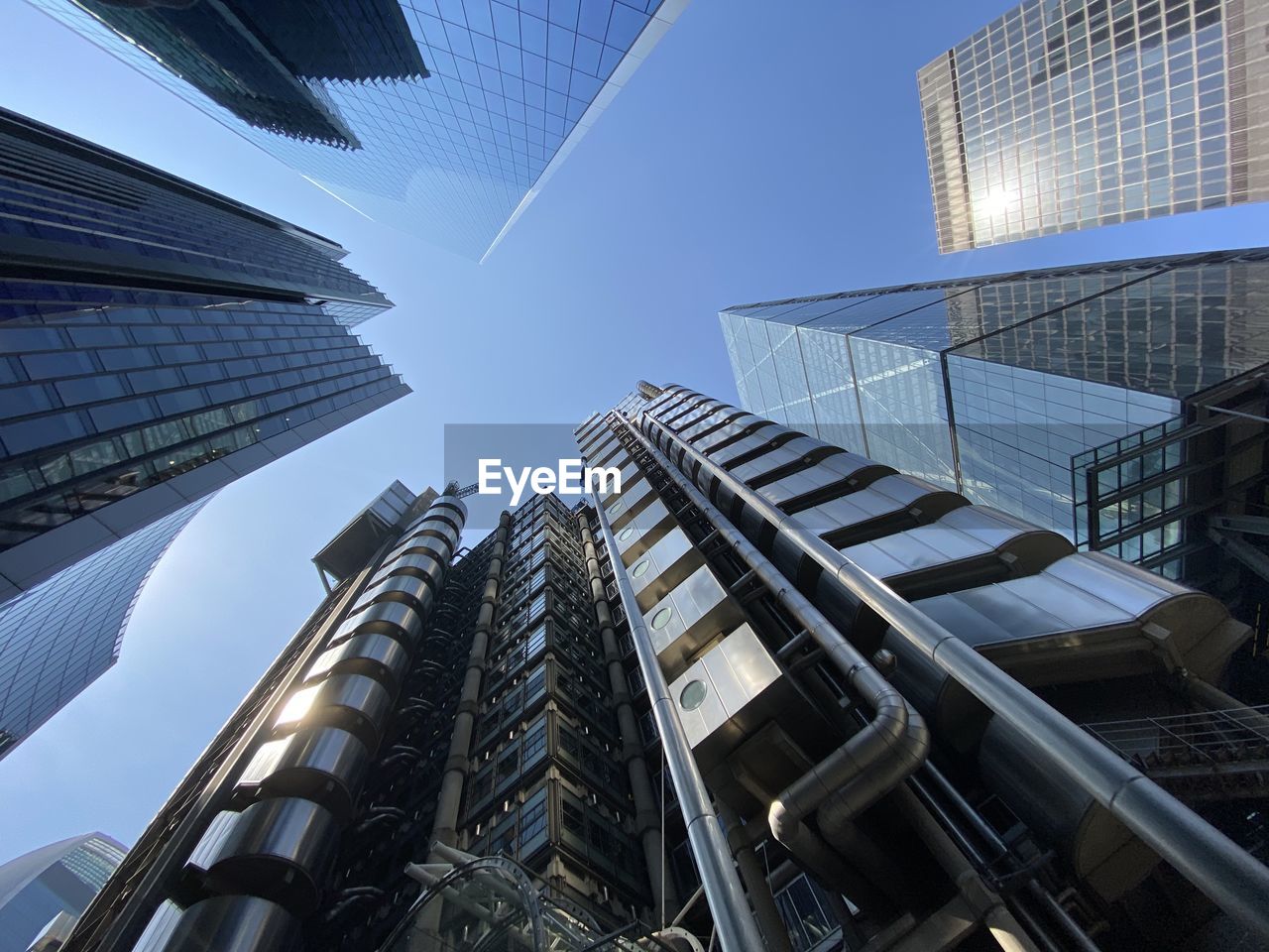 Low angle view of modern buildings against sky