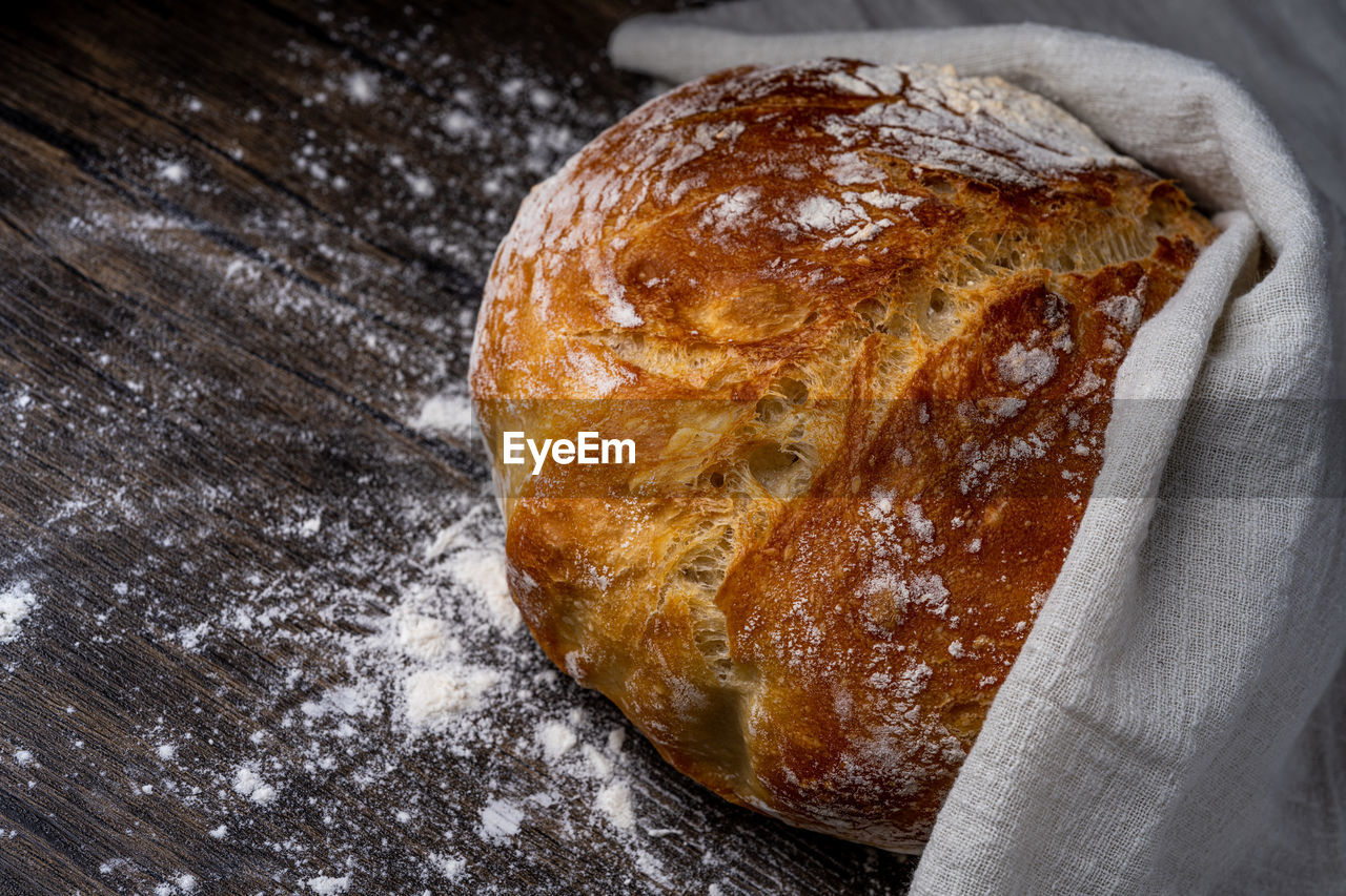 Closeup of homemade crusty bread on table