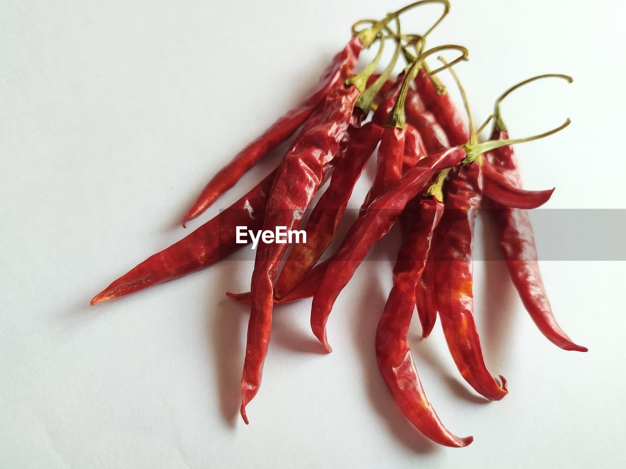 HIGH ANGLE VIEW OF RED CHILI PEPPERS