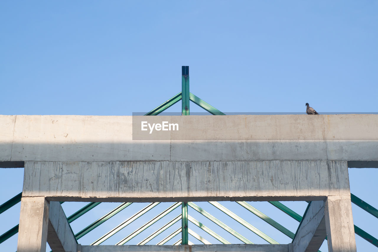 LOW ANGLE VIEW OF BRIDGE AGAINST SKY