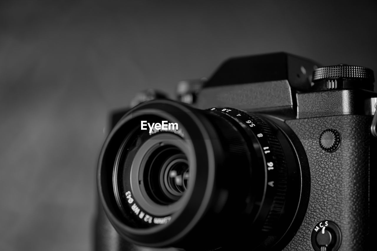 CLOSE-UP OF CAMERA AND KEYBOARD