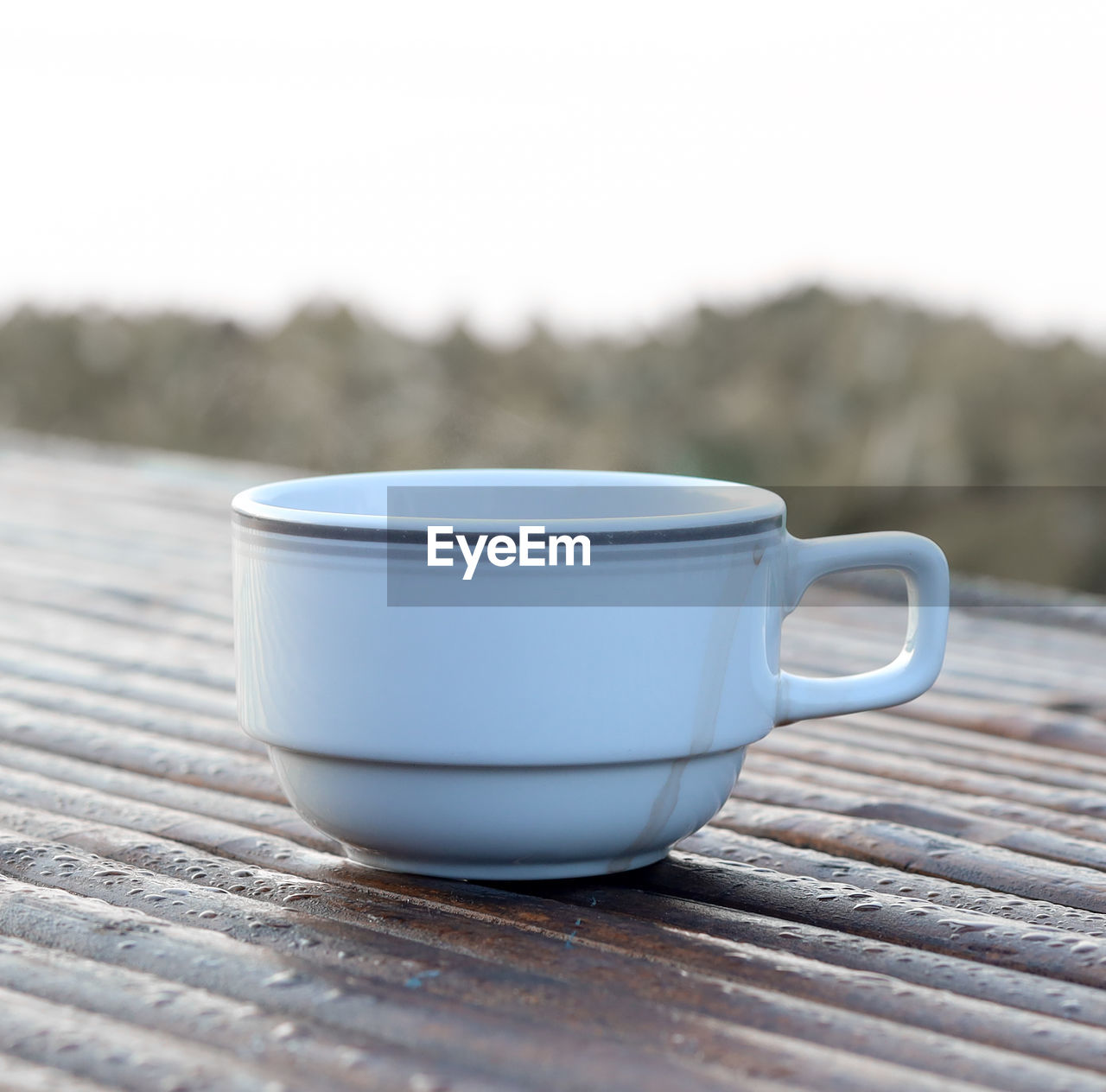 Close-up of coffee cup on table