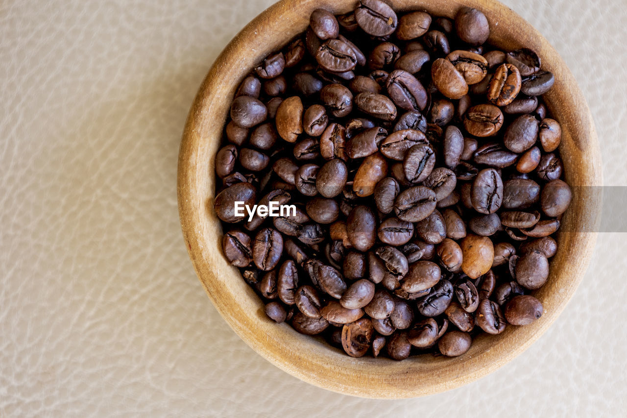 food and drink, food, coffee, roasted coffee bean, freshness, drink, brown, cup, indoors, still life, close-up, no people, large group of objects, directly above, healthy eating, refreshment, produce, coffee cup, studio shot, wellbeing, high angle view, table, abundance