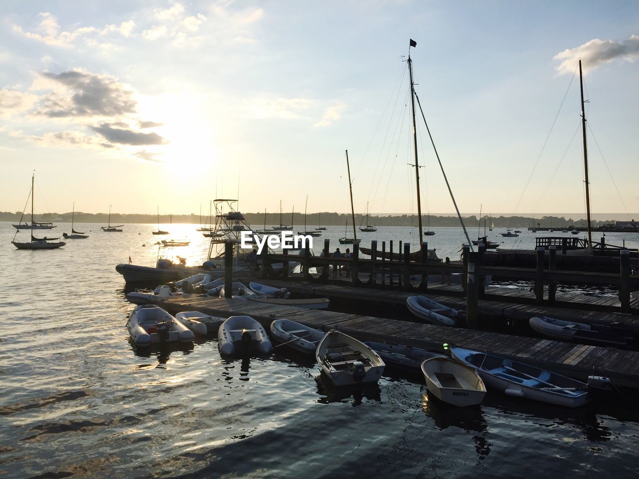 BOATS MOORED IN SEA