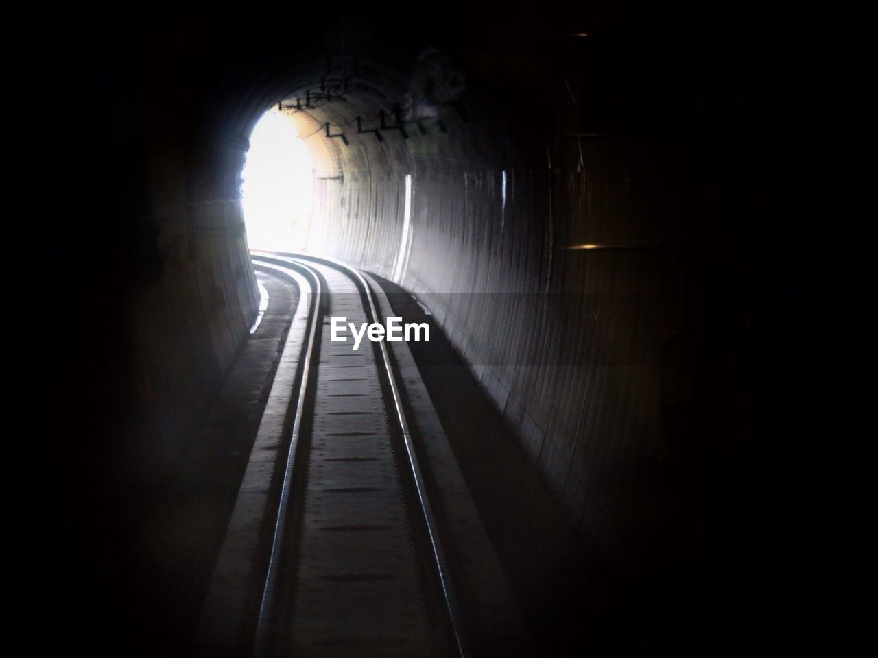 Railroad tracks passing through a tunnel