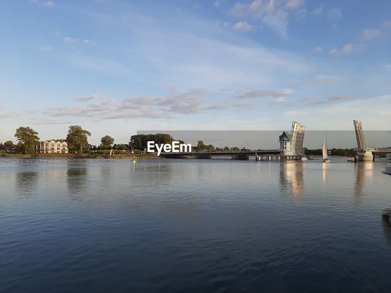 Scenic view of river against sky