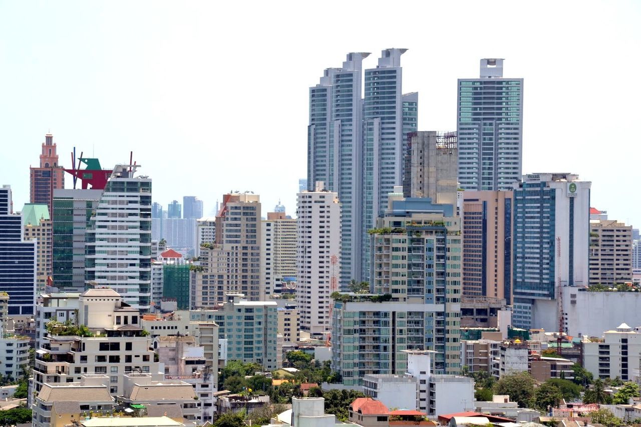 Skyscrapers in city against clear sky