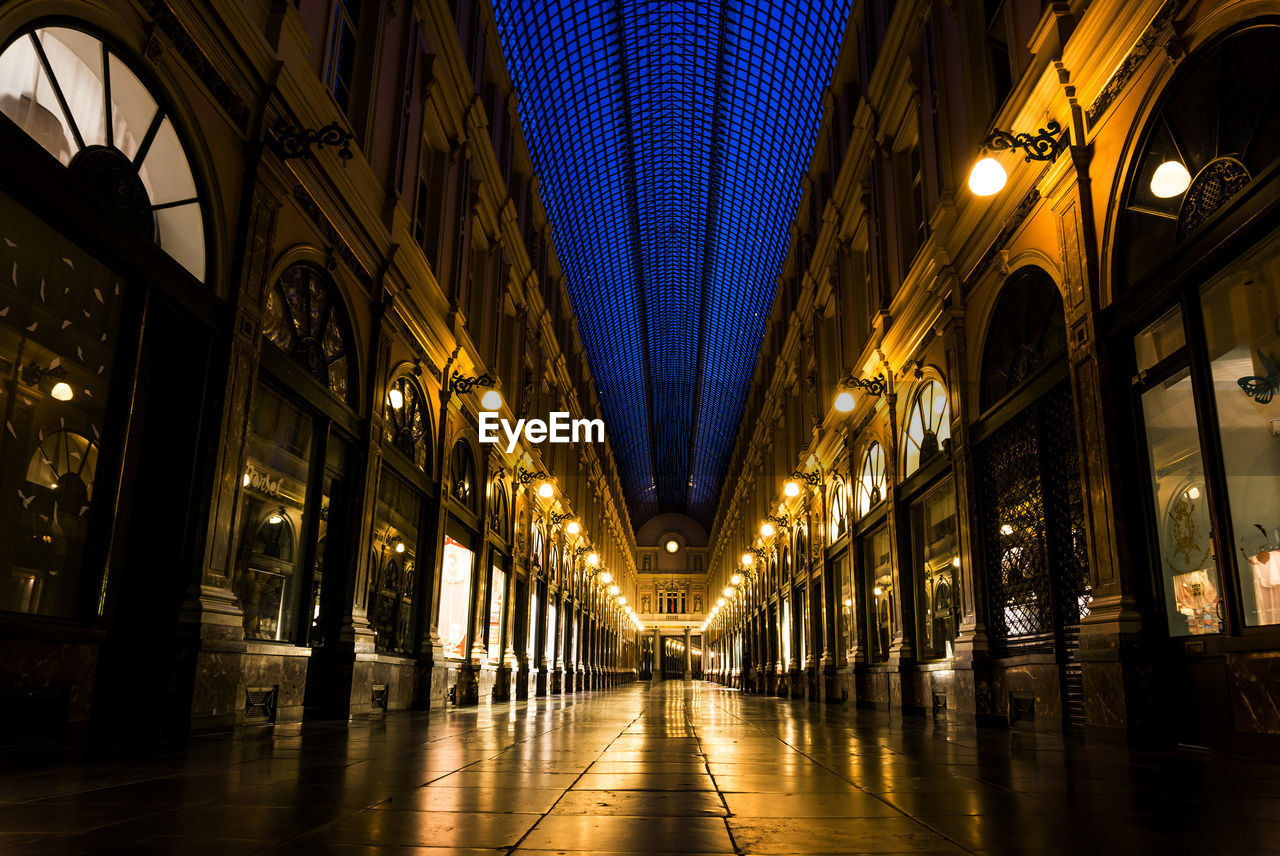 Illuminated corridor of building