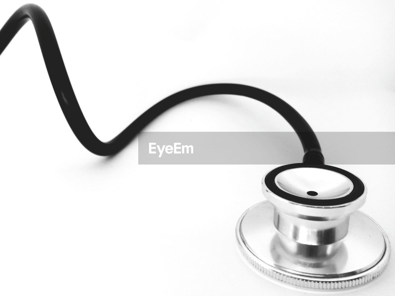 Close-up of stethoscope against white background