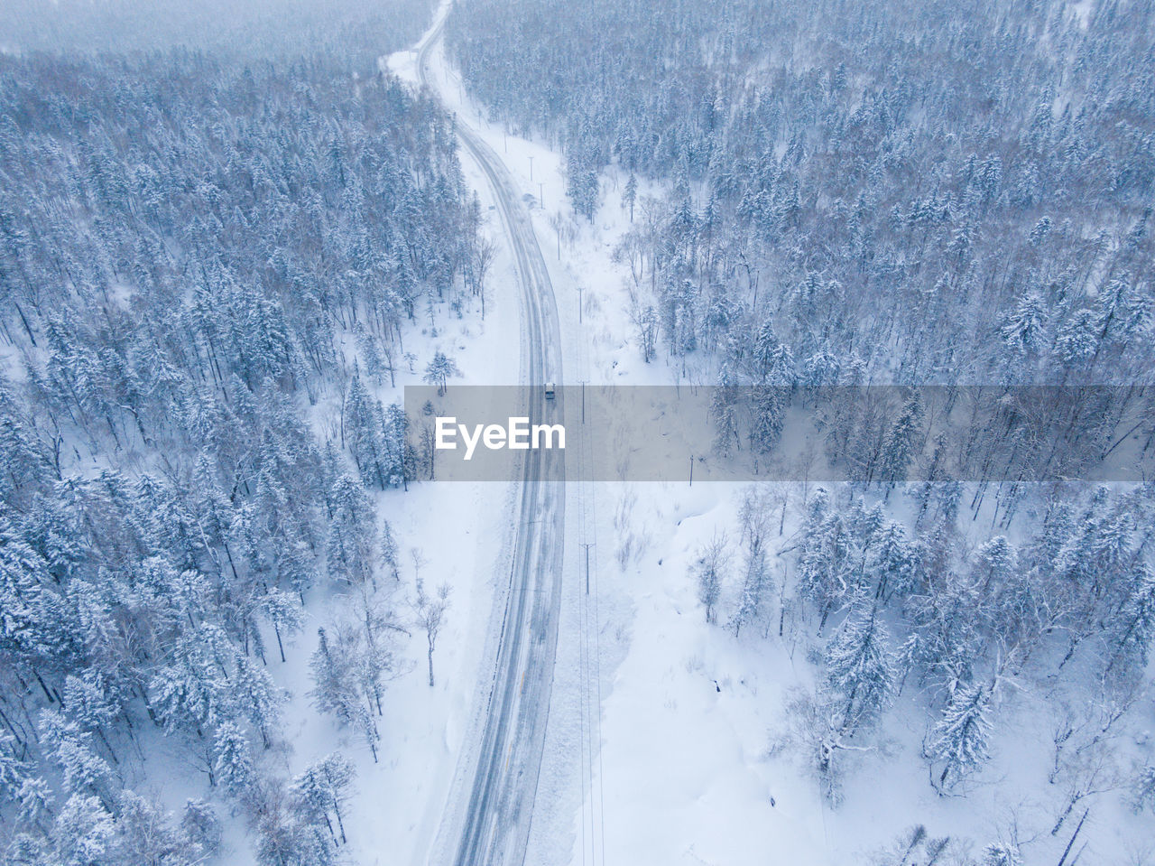 High angle view of snow covered land