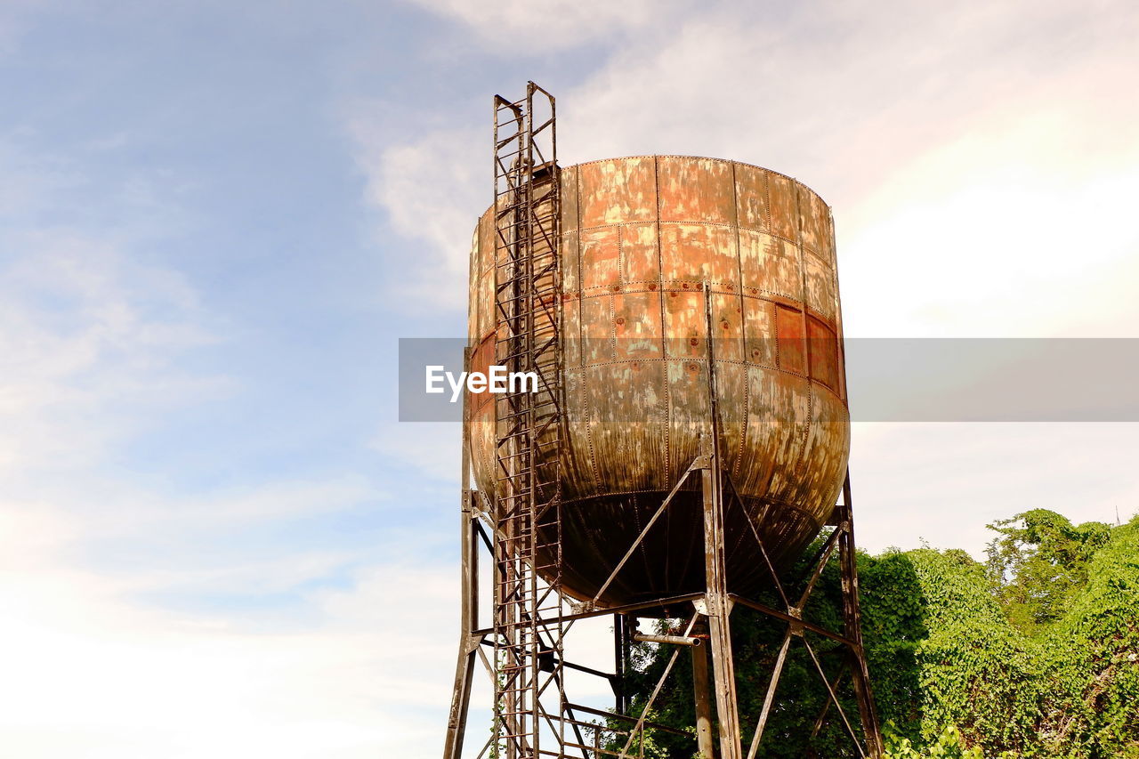 Low angle view of water tower against sky