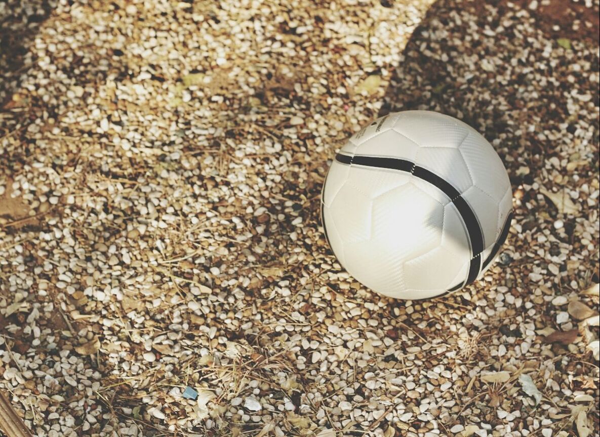 High angle view of soccer ball on field